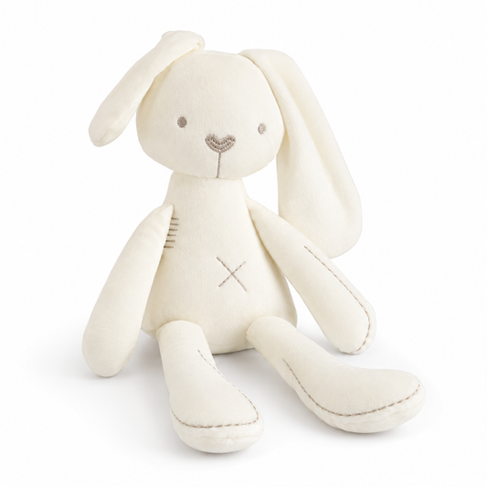 White plush bunny toy on a white background
